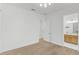 Spacious bedroom with an ensuite bathroom and light flooring at 5035 Kiva Cir, Bradenton, FL 34211