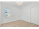 Bright bedroom with wood-look floors and ample natural light at 5035 Kiva Cir, Bradenton, FL 34211