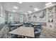 Community room with tables and chairs, ideal for gatherings at 5035 Kiva Cir, Bradenton, FL 34211
