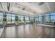 Bright dance studio with barre, wall mirrors and wood flooring at 5035 Kiva Cir, Bradenton, FL 34211