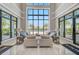 Community lobby with comfortable seating and pool view at 5035 Kiva Cir, Bradenton, FL 34211