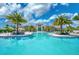 Resort-style pool with lounge chairs and a view of the clubhouse at 5035 Kiva Cir, Bradenton, FL 34211