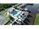 Aerial view of waterfront community with pool, marina, and tennis court at 515 Leffingwell Ave # 109, Ellenton, FL 34222