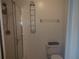 Clean bathroom with shower and tile surround at 515 Leffingwell Ave # 109, Ellenton, FL 34222