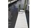 White wooden dock with water access and hose at 515 Leffingwell Ave # 109, Ellenton, FL 34222