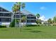 Building exterior showcasing a well-maintained lawn at 515 Leffingwell Ave # 109, Ellenton, FL 34222