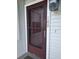 Exterior view of building with brown front door at 515 Leffingwell Ave # 109, Ellenton, FL 34222