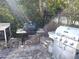 Two grills and prep table in a backyard setting at 515 Leffingwell Ave # 109, Ellenton, FL 34222