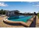 Community pool with lounge chairs and dock access at 515 Leffingwell Ave # 109, Ellenton, FL 34222