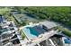 Community pool with adjacent boat slips and clubhouse at 515 Leffingwell Ave # 109, Ellenton, FL 34222