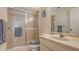 Clean bathroom with shower/tub combo and updated vanity at 5242 Wedgewood Ln # 62, Sarasota, FL 34235