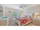 Bright bedroom featuring a comfortable bed and ample closet space at 5242 Wedgewood Ln # 62, Sarasota, FL 34235