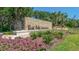The Meadows community entrance with landscaping at 5242 Wedgewood Ln # 62, Sarasota, FL 34235