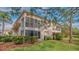 Well-maintained condo building with screened-in patio at 5242 Wedgewood Ln # 62, Sarasota, FL 34235