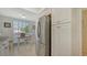 Eat-in kitchen with stainless steel refrigerator and ample storage at 5242 Wedgewood Ln # 62, Sarasota, FL 34235