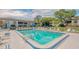Refreshing community pool with plenty of lounge chairs at 5242 Wedgewood Ln # 62, Sarasota, FL 34235
