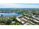 Aerial view highlighting condo community near lake at 527 Spring Lakes Blvd, Bradenton, FL 34210