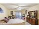 Bright bedroom with a king-size bed and plenty of storage at 527 Spring Lakes Blvd, Bradenton, FL 34210