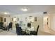 Dining area with glass table and mirrored wall at 527 Spring Lakes Blvd, Bradenton, FL 34210