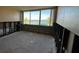 Large bedroom with water damage, ready for renovation, features bay view at 5277 Isla Key S Blvd # 321, St Petersburg, FL 33715