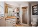 Clean bathroom with granite countertop and walk-in shower at 530 Saint Andrews Dr, Sarasota, FL 34243
