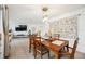 Bright dining room featuring a wood table and chairs, ready for gatherings at 530 Saint Andrews Dr, Sarasota, FL 34243