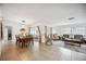 Open floor plan with dining area and access to backyard at 530 Saint Andrews Dr, Sarasota, FL 34243