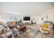 Comfortable living room with large windows and ample natural light at 530 Saint Andrews Dr, Sarasota, FL 34243