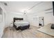 Spacious main bedroom with a king-size bed and an en-suite bathroom at 530 Saint Andrews Dr, Sarasota, FL 34243