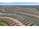 Aerial perspective of a house situated in a large waterfront community at 5341 Popoli Way, Sarasota, FL 34238