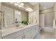 Clean bathroom with double vanity and bathtub at 5341 Popoli Way, Sarasota, FL 34238