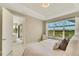 Serene bedroom with water views and private access at 5341 Popoli Way, Sarasota, FL 34238