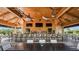 Community bar with a unique design and large TV screens at 5341 Popoli Way, Sarasota, FL 34238