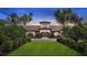 Community clubhouse with attractive exterior and landscaping at 5341 Popoli Way, Sarasota, FL 34238