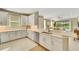 Open concept kitchen with stainless steel appliances at 5341 Popoli Way, Sarasota, FL 34238
