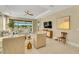 Living area with access to pool and patio at 5341 Popoli Way, Sarasota, FL 34238