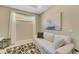 Cozy living room featuring a sofa and stylish rug at 5341 Popoli Way, Sarasota, FL 34238