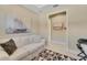 Spacious living room with access to hallway and office space at 5341 Popoli Way, Sarasota, FL 34238