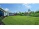 Spacious backyard with grassy lawn at 5436 Hope Sound Cir, Sarasota, FL 34238