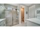 Bathroom boasts a walk-in shower and modern vanity at 5436 Hope Sound Cir, Sarasota, FL 34238