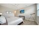 Bedroom with a TV, comfortable bed and telescope at 5436 Hope Sound Cir, Sarasota, FL 34238