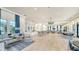 Community room with comfortable seating and a fireplace at 5436 Hope Sound Cir, Sarasota, FL 34238