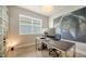 Spacious home office with large desk, monitor and art at 5436 Hope Sound Cir, Sarasota, FL 34238
