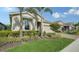 Beautiful two-story home with a well-manicured lawn at 5436 Hope Sound Cir, Sarasota, FL 34238