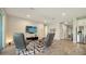 Relaxing living room features leather recliners and large TV at 5436 Hope Sound Cir, Sarasota, FL 34238