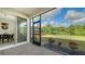 Screened patio with brick pavers, overlooking a grassy backyard at 5436 Hope Sound Cir, Sarasota, FL 34238