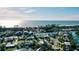 Picturesque coastal community with waterfront properties, canals, and proximity to the beach at 6011 Emerald Harbor Dr, Longboat Key, FL 34228