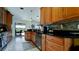 Modern kitchen with stainless steel appliances and wood cabinets at 6838 67Th Street E Cir, Palmetto, FL 34221