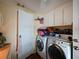 Convenient laundry room with washer, dryer, and ample storage at 8524 Imperial Cir # 8524, Palmetto, FL 34221