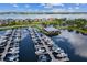 Aerial view of the docks with boats on the water, and colorful buildings at 942 Preservation St, Bradenton, FL 34208
